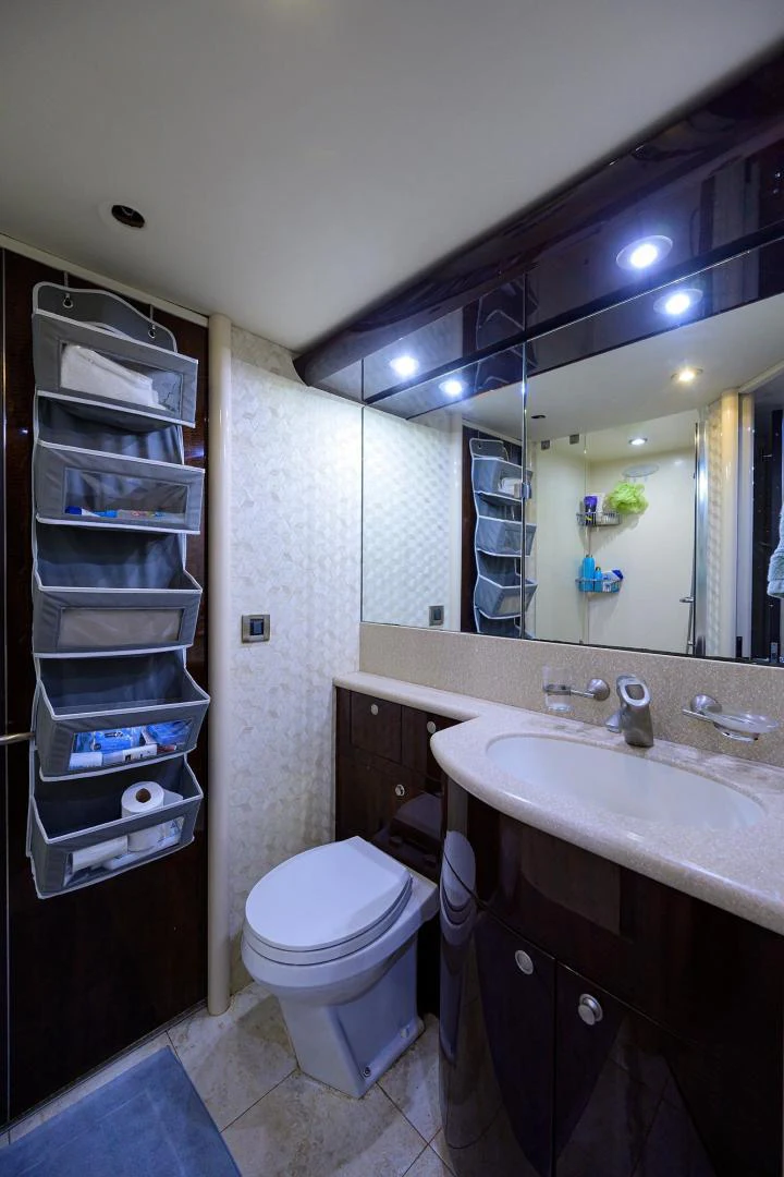 a bathroom with a mirror and a sink aboard PURE ROMANCE Yacht for Sale