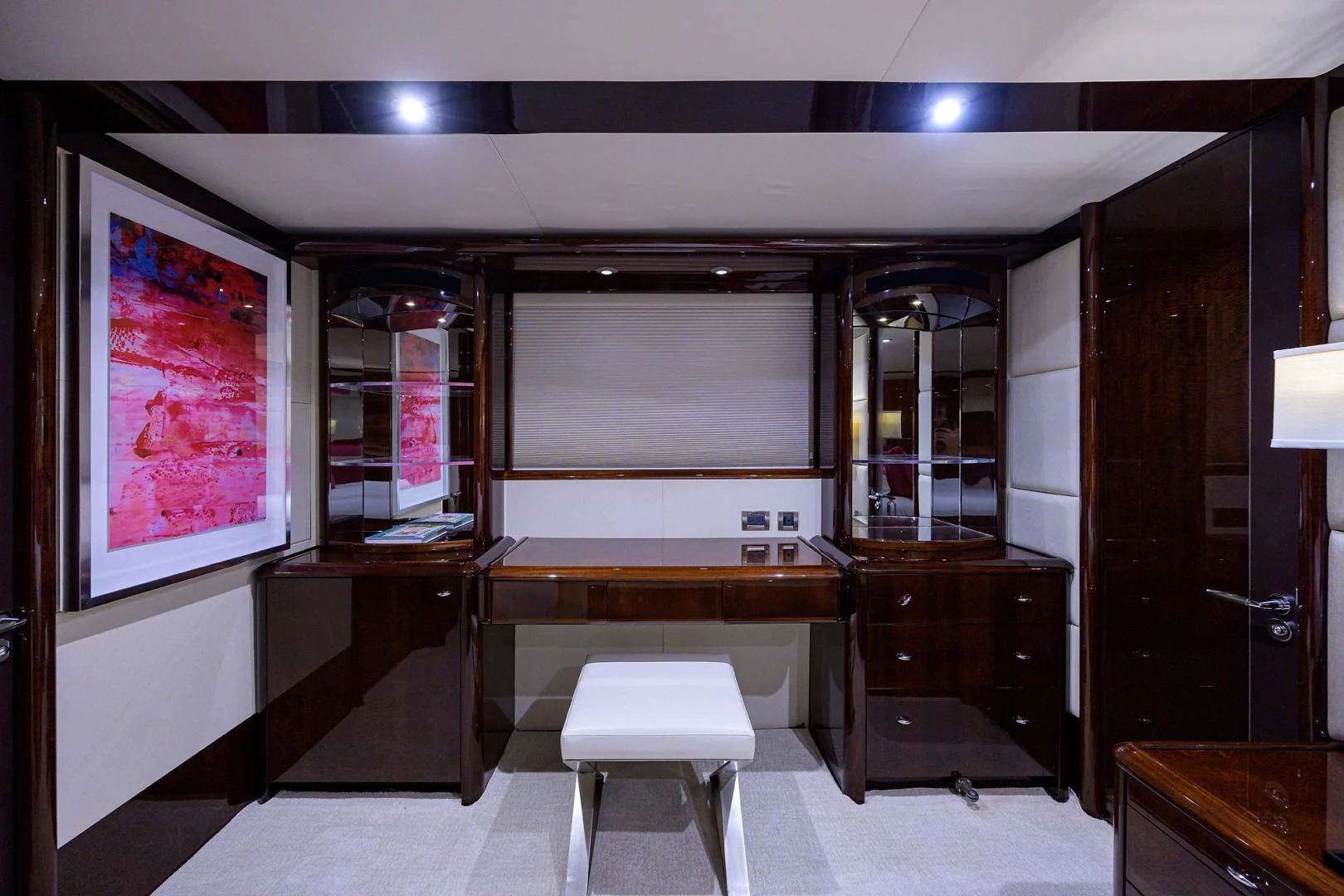 a room with a large mirror and a counter with a sink and a mirror aboard PURE ROMANCE Yacht for Sale
