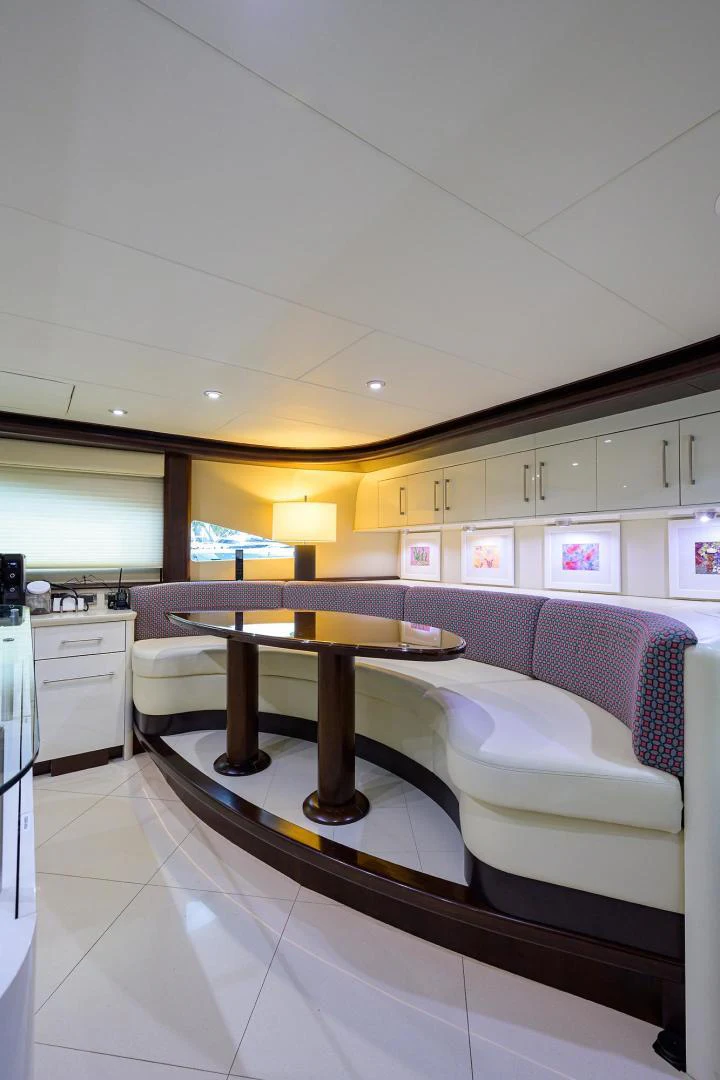 a kitchen and dining room aboard PURE ROMANCE Yacht for Sale
