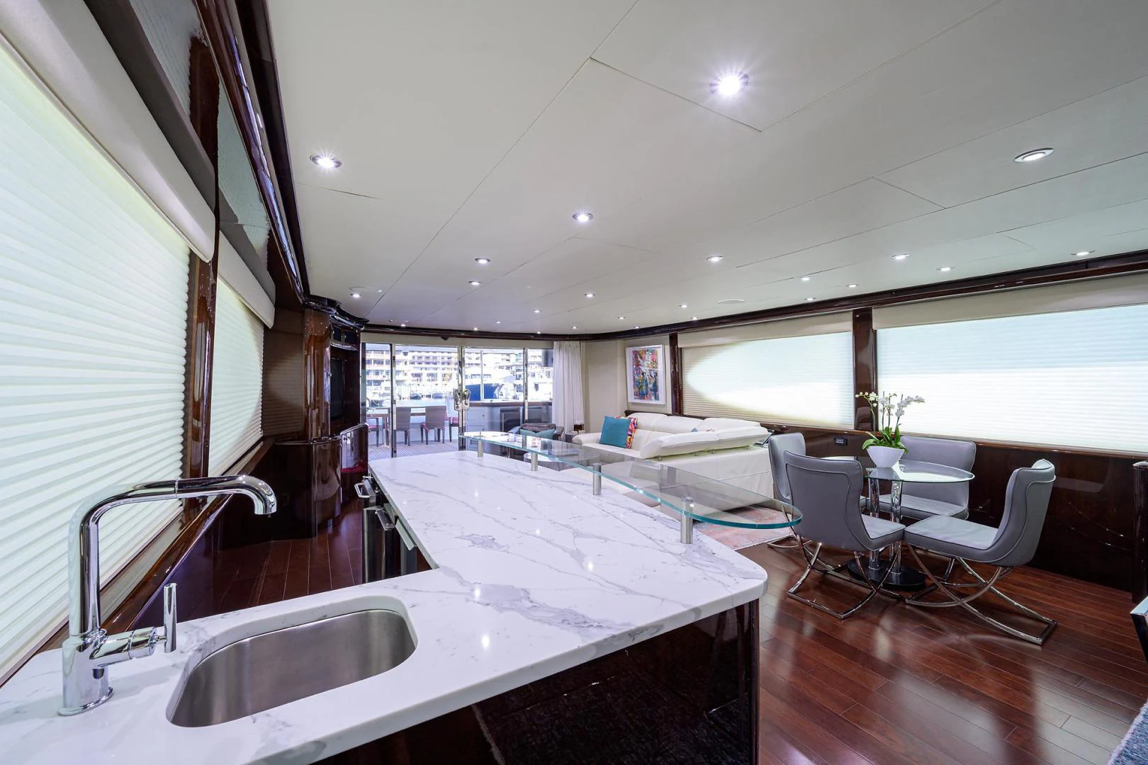 a kitchen with a large island aboard PURE ROMANCE Yacht for Sale