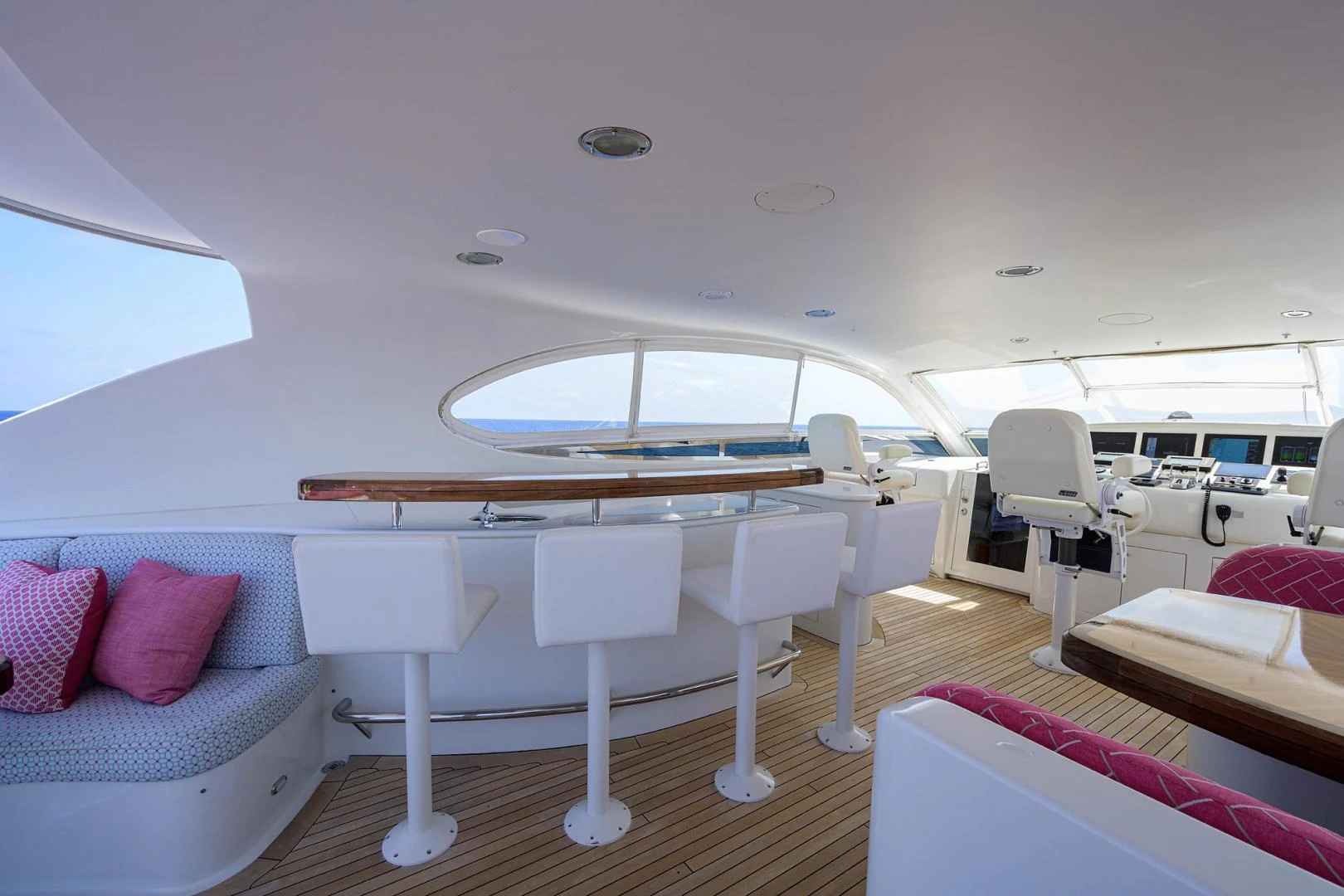 a large white piano in a room aboard PURE ROMANCE Yacht for Sale