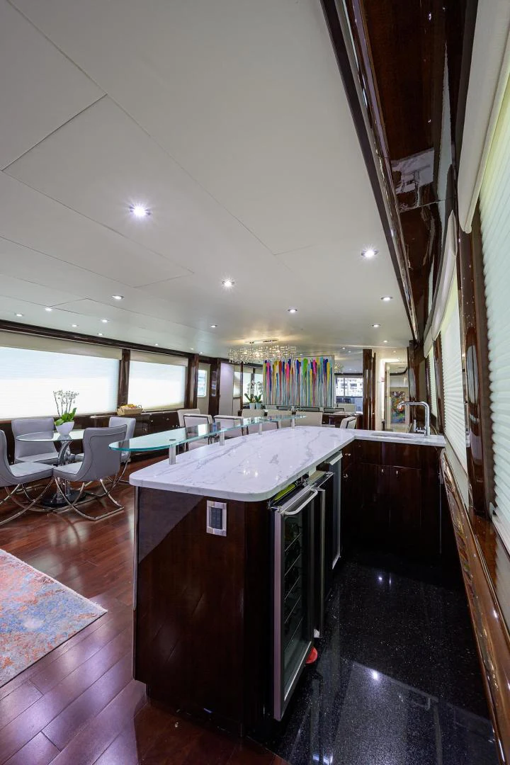 a large kitchen with a large island aboard PURE ROMANCE Yacht for Sale