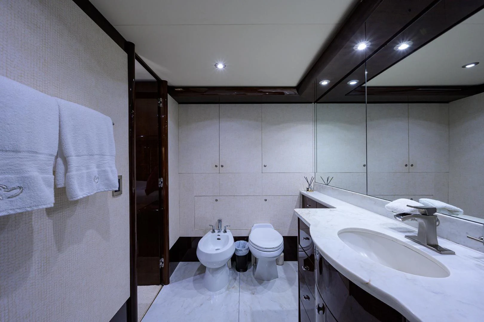 a bathroom with a sink toilet and a bathtub aboard PURE ROMANCE Yacht for Sale