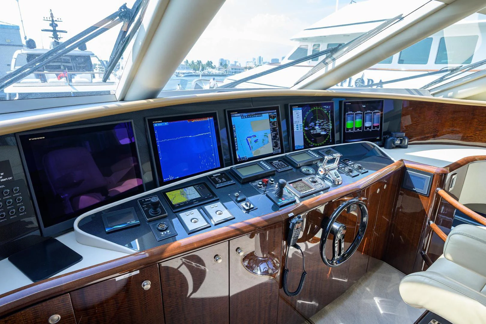 a room with many computer screens aboard PURE ROMANCE Yacht for Sale