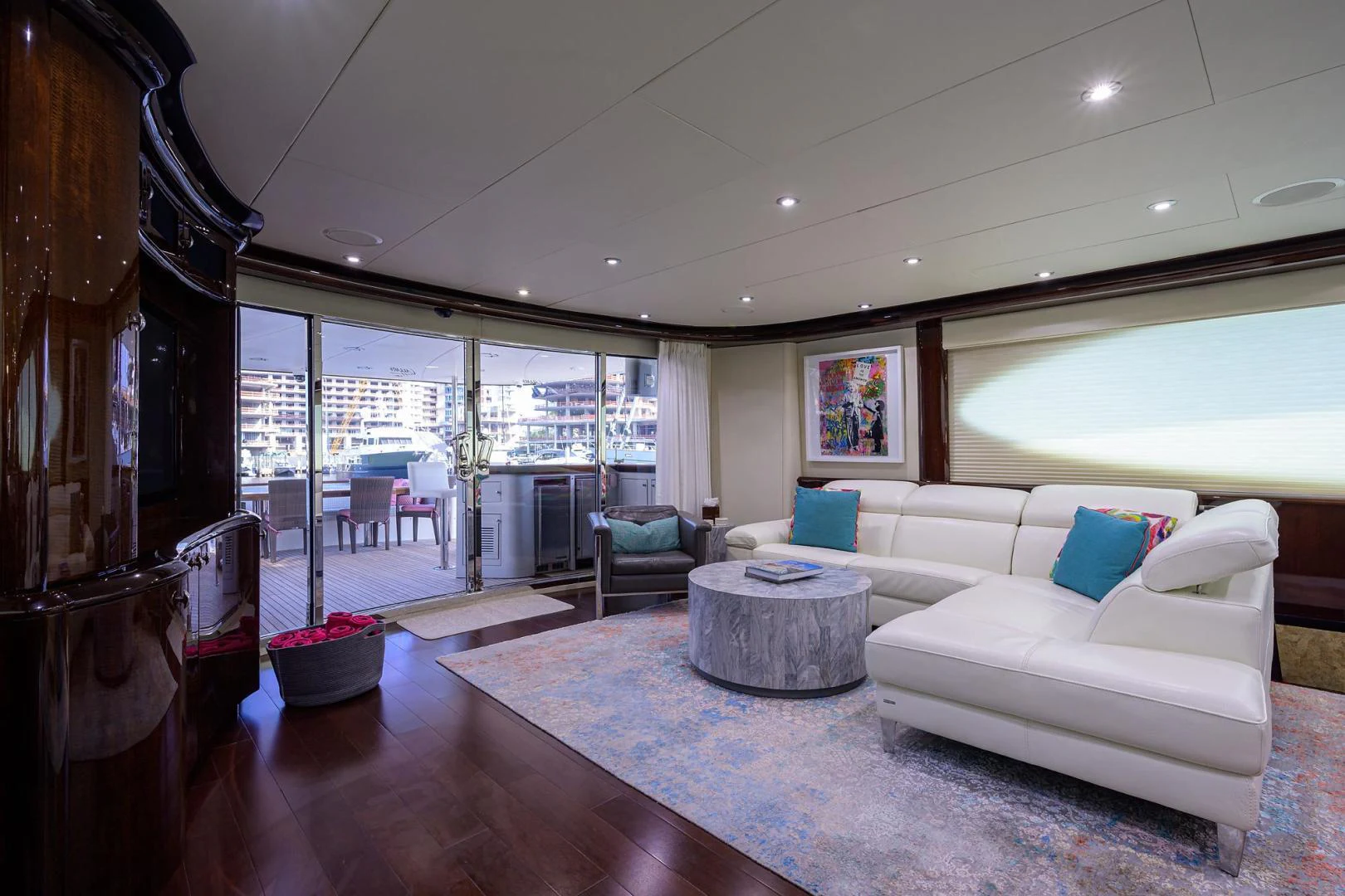 a living room with a large window aboard PURE ROMANCE Yacht for Sale