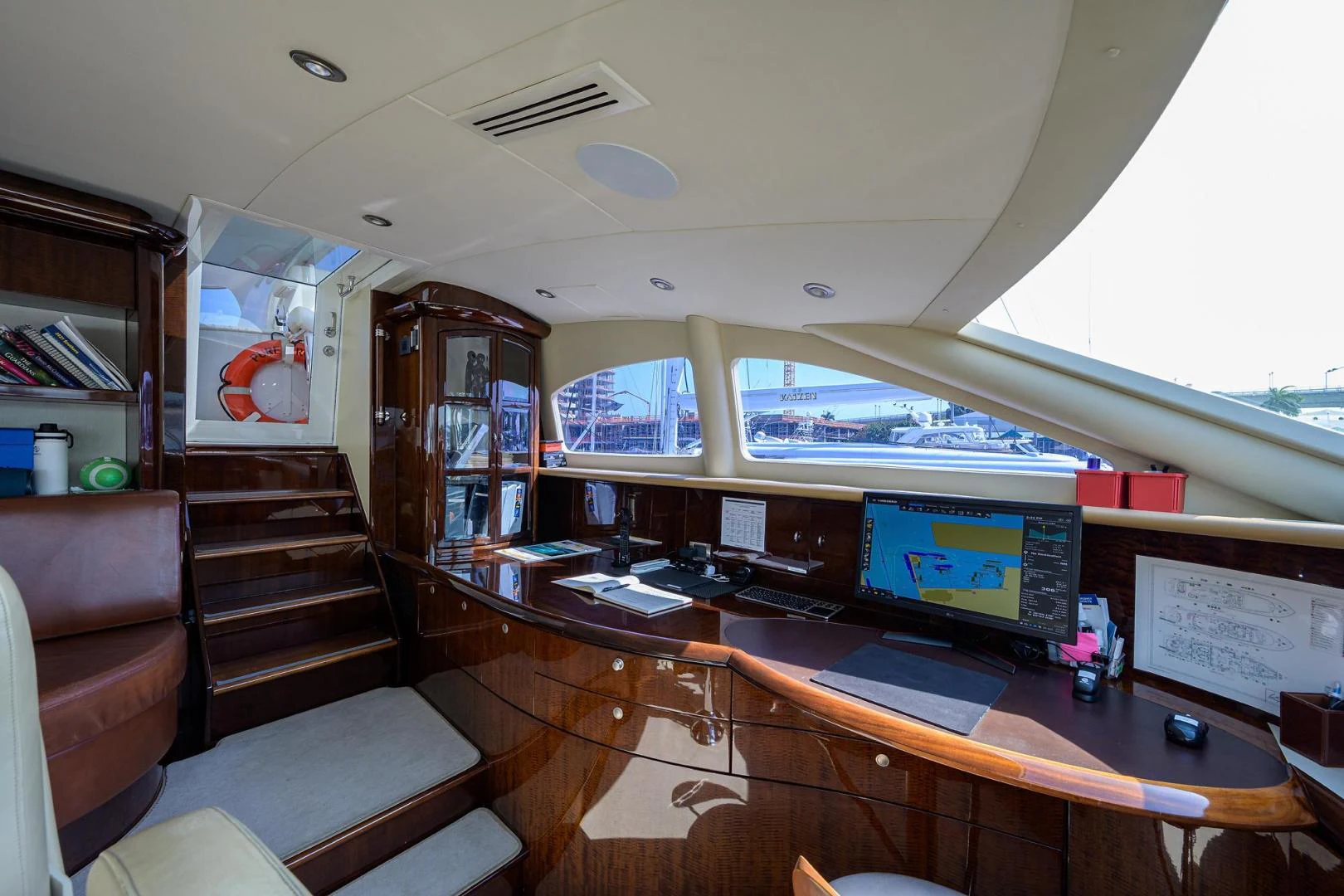 a room with a desk and a computer aboard PURE ROMANCE Yacht for Sale