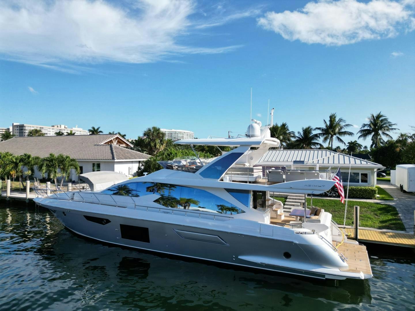 a boat docked at a pier aboard VELOCITY Yacht for Sale