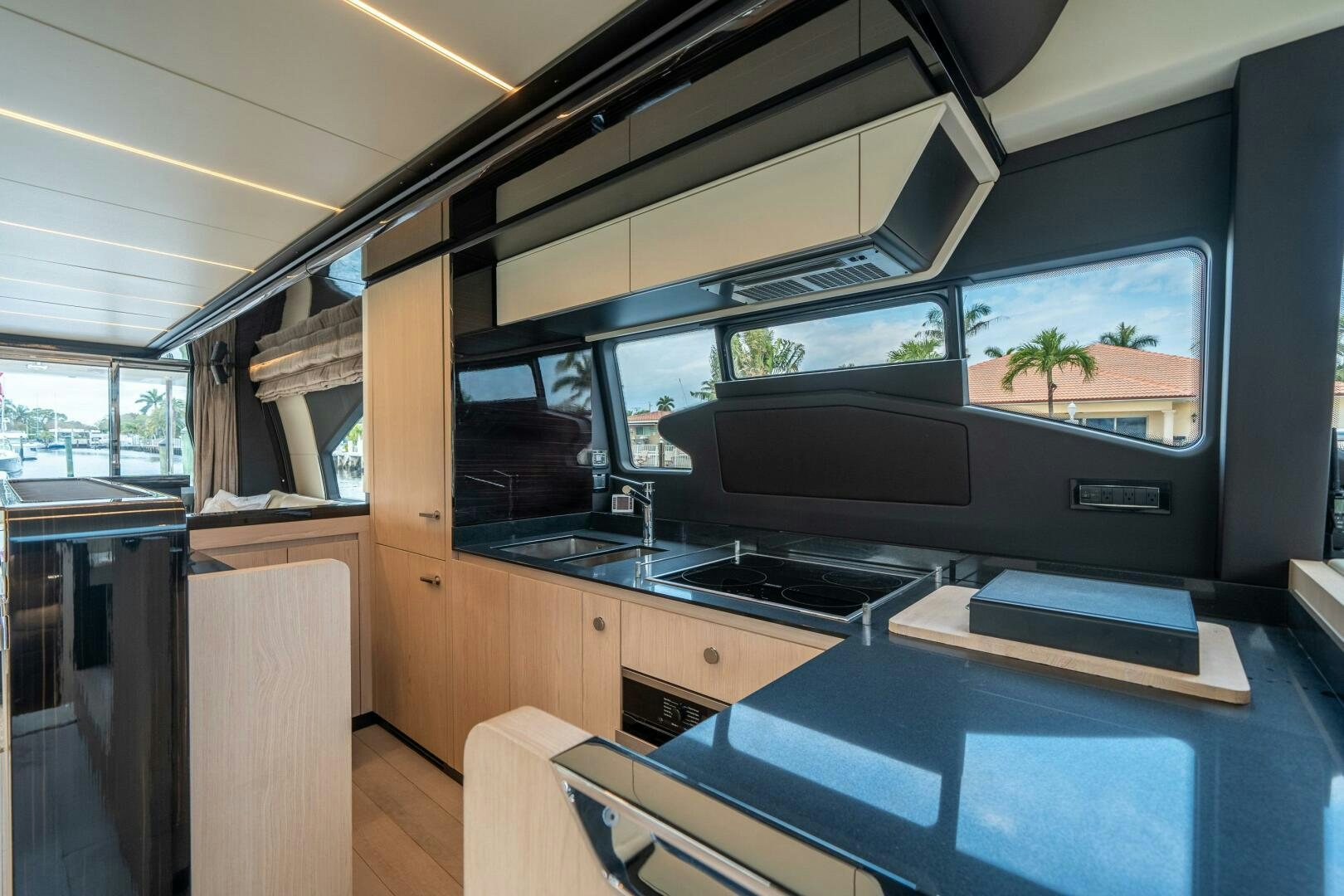 a kitchen with a large window aboard VELOCITY Yacht for Sale