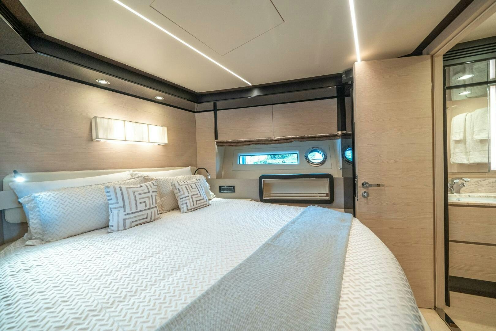 a bed in a room aboard VELOCITY Yacht for Sale