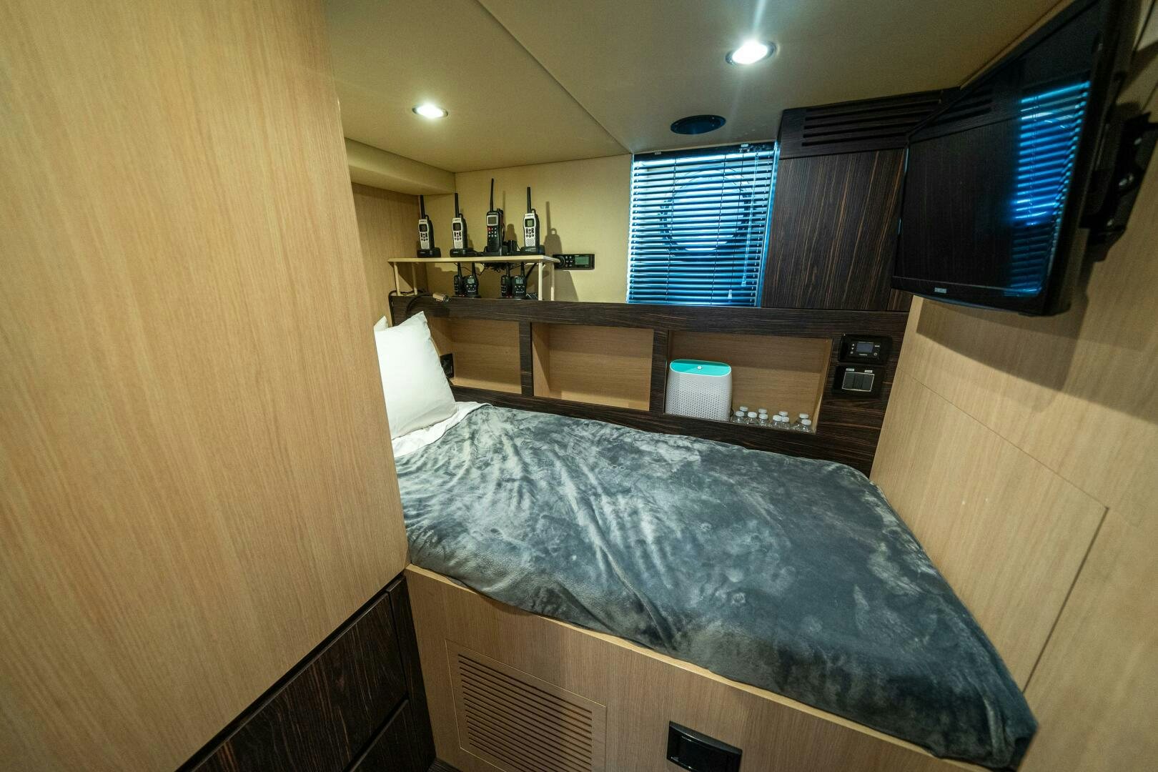 a bed in a room aboard VELOCITY Yacht for Sale