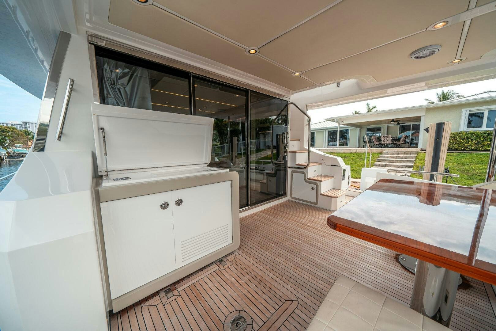 a room with a table and chairs aboard VELOCITY Yacht for Sale