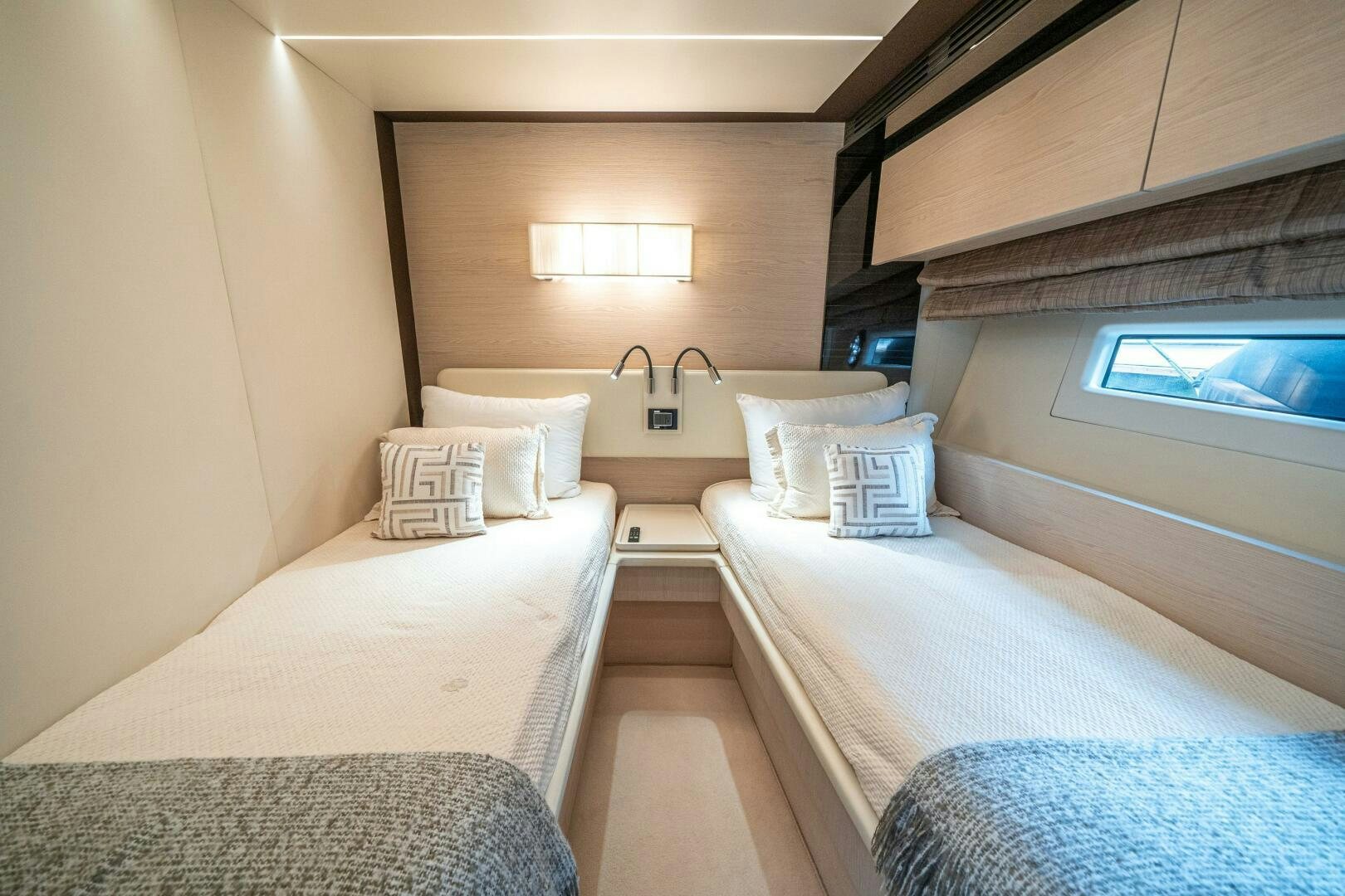 a room with two beds aboard VELOCITY Yacht for Sale