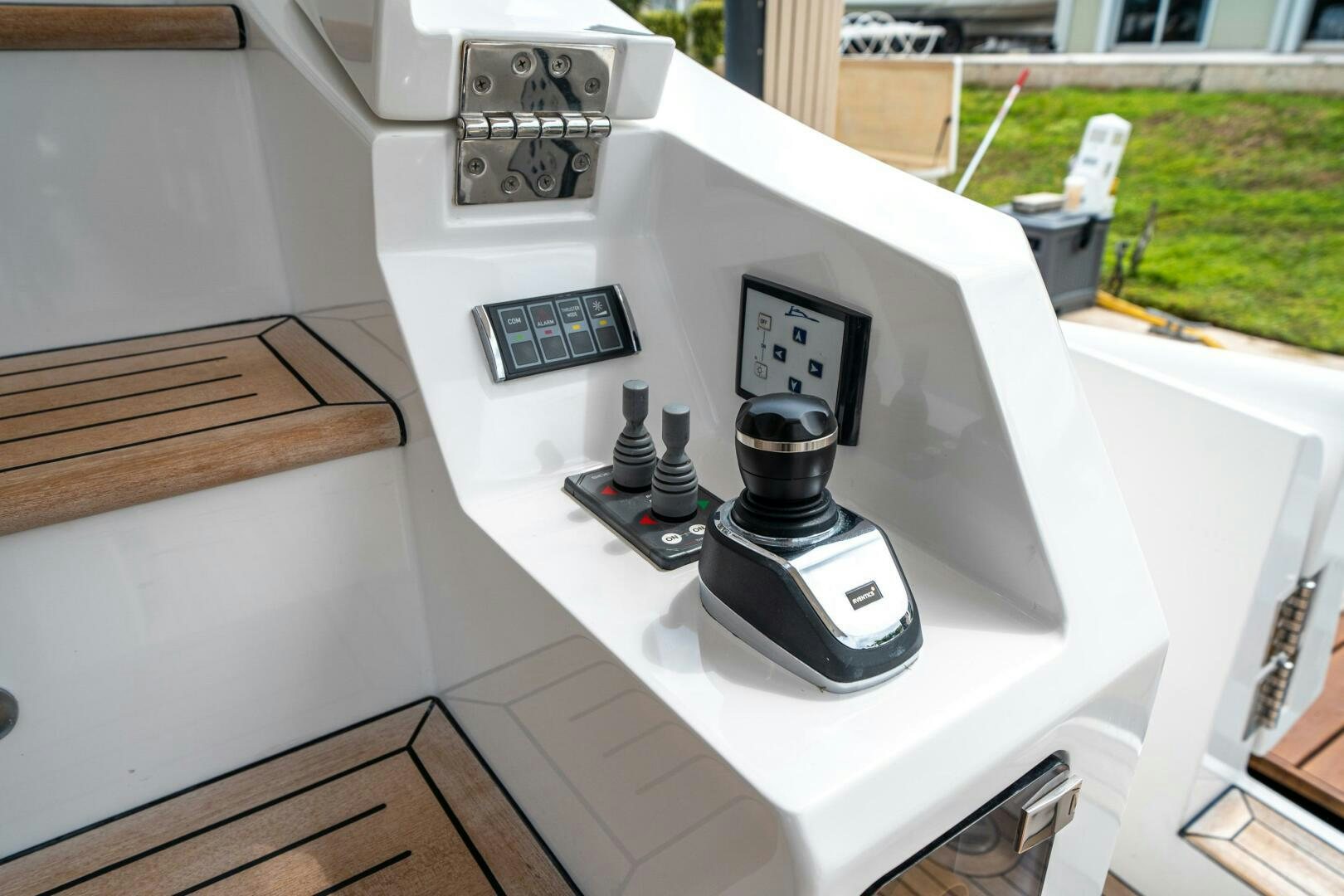 a white machine with a black dial aboard VELOCITY Yacht for Sale