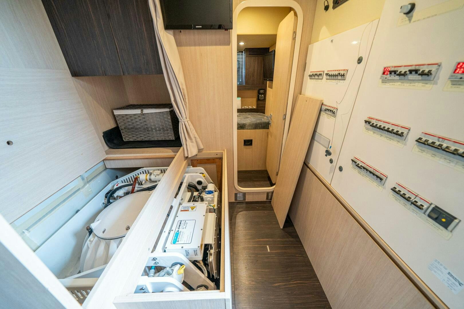a room with a sink and a washing machine aboard VELOCITY Yacht for Sale