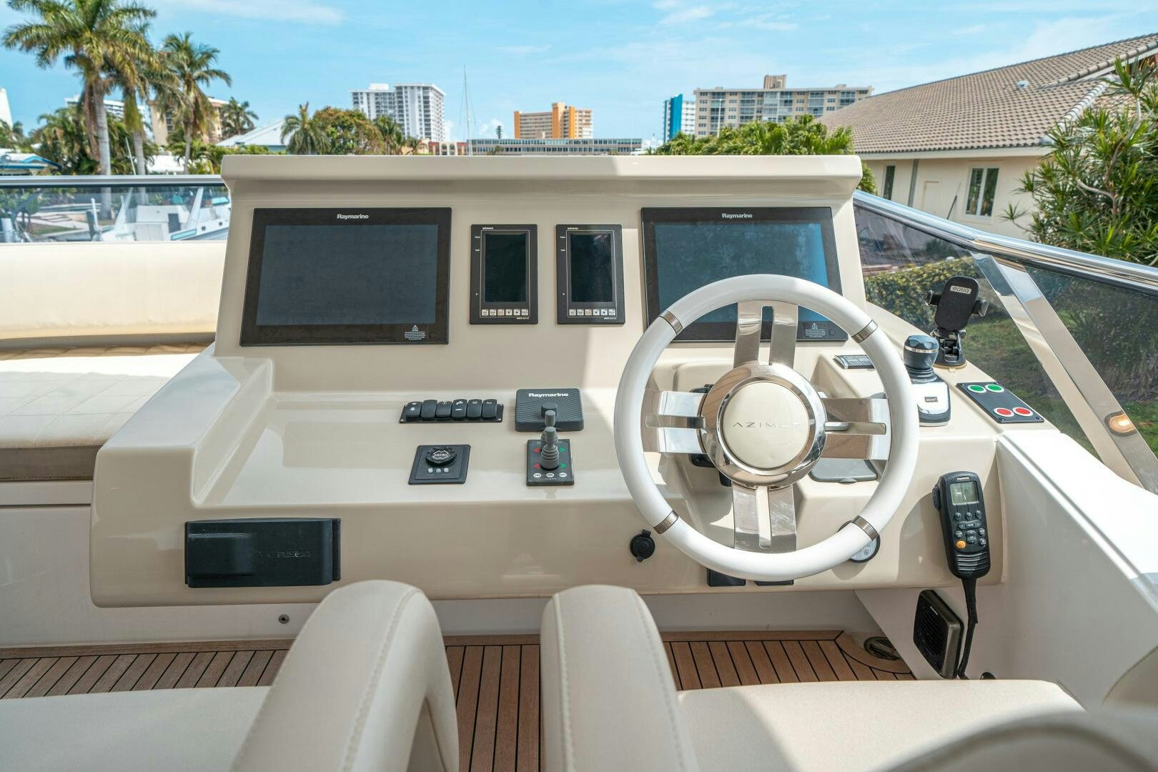 a white car with a screen aboard VELOCITY Yacht for Sale