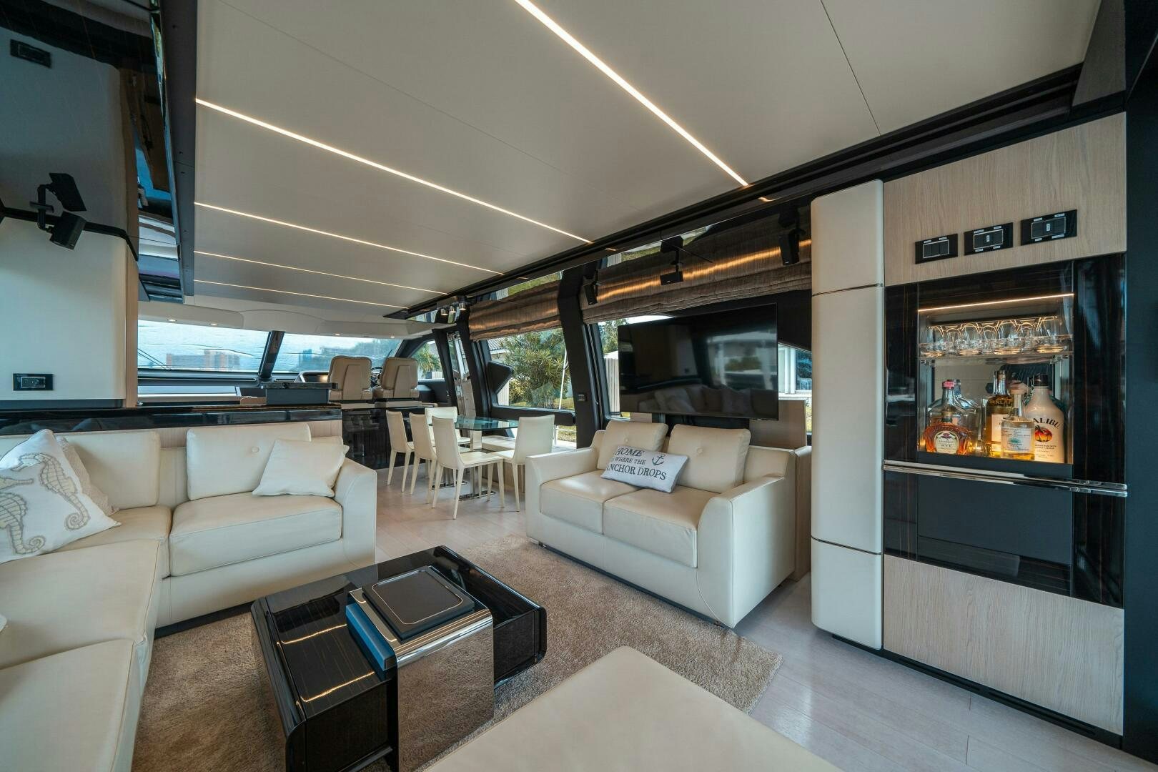 a living room with a large glass door aboard VELOCITY Yacht for Sale