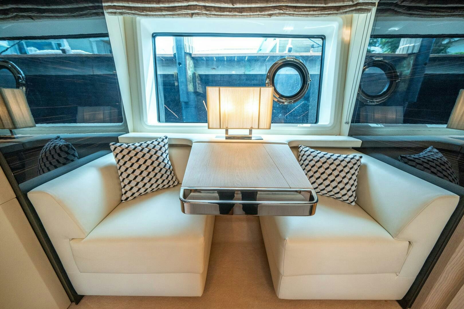 a living room with a couch and a table aboard VELOCITY Yacht for Sale