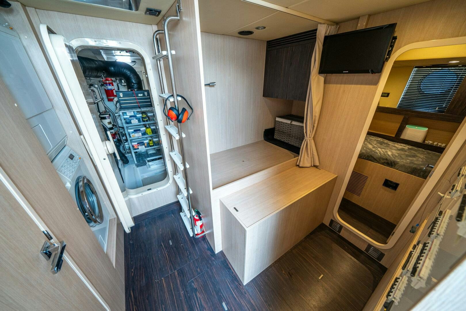 a room with a desk and a computer aboard VELOCITY Yacht for Sale
