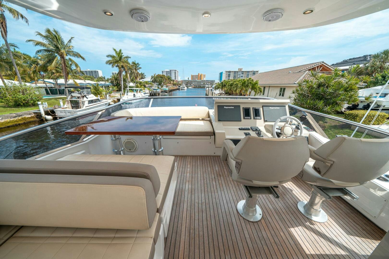 a deck with a pool and chairs aboard VELOCITY Yacht for Sale