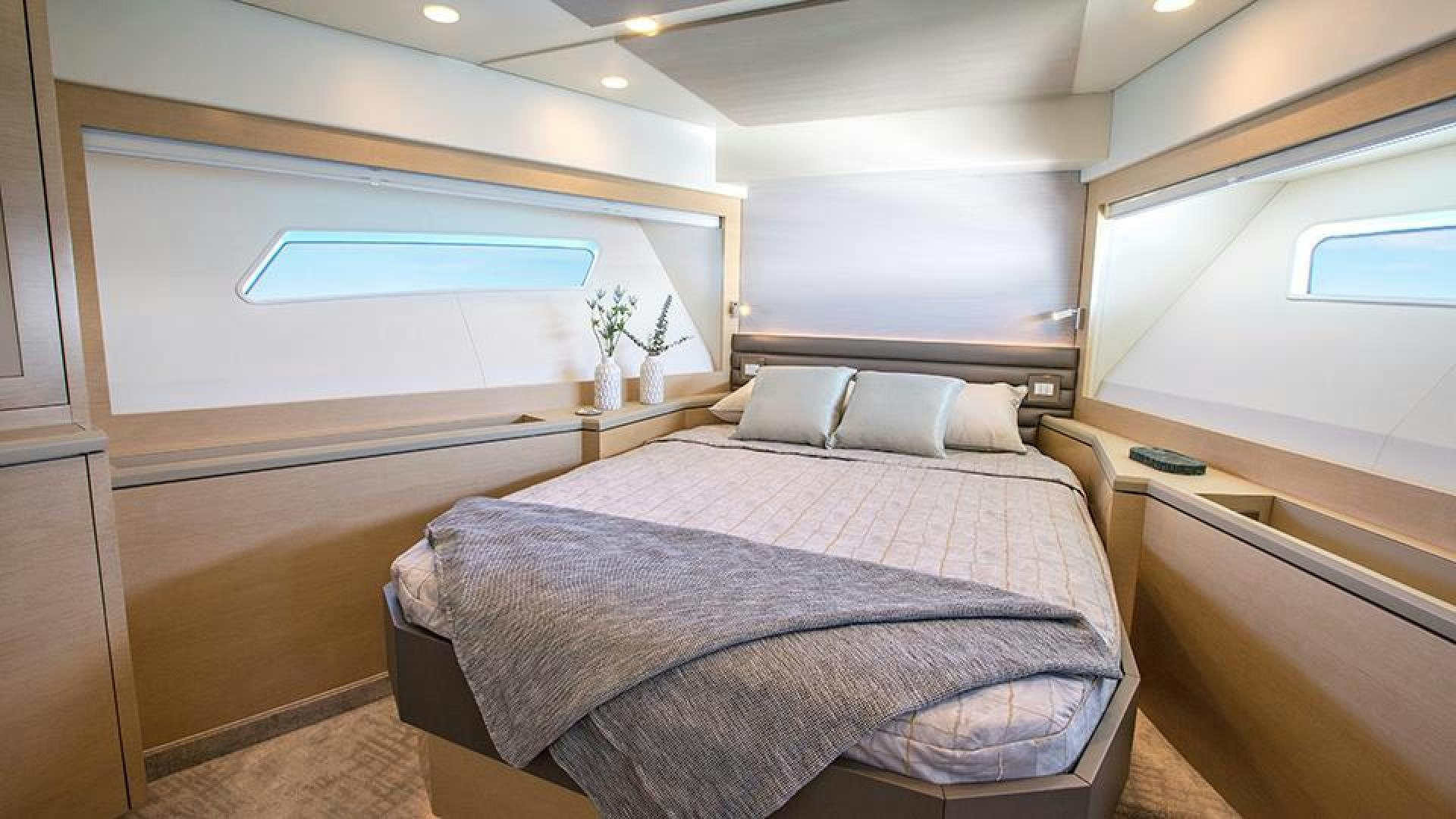 a bed in a room aboard ABSOLUTELY Yacht for Sale