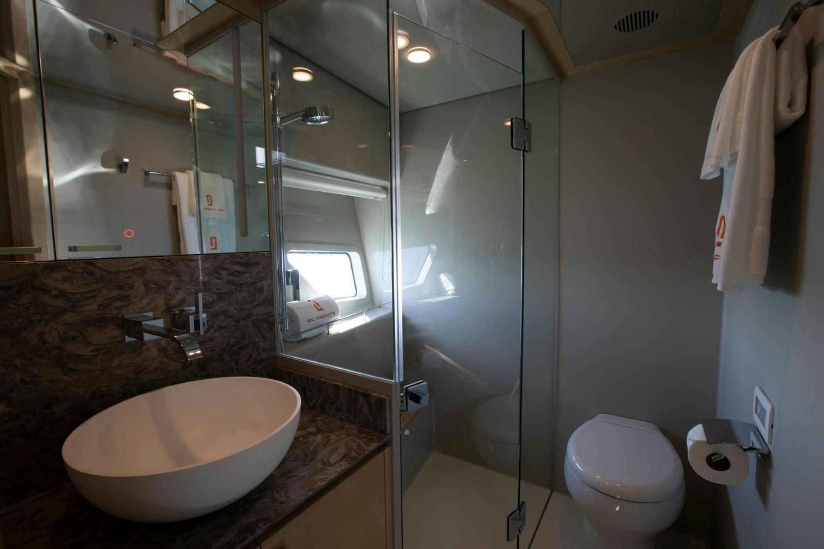 a bathroom with a glass shower aboard ABSOLUTELY Yacht for Sale