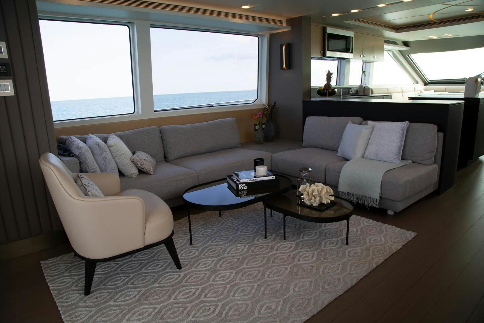 a living room with a couch and a coffee table aboard ABSOLUTELY Yacht for Sale