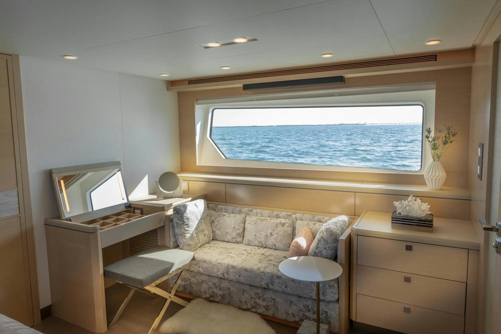 a living room with a couch and a tv aboard ABSOLUTELY Yacht for Sale