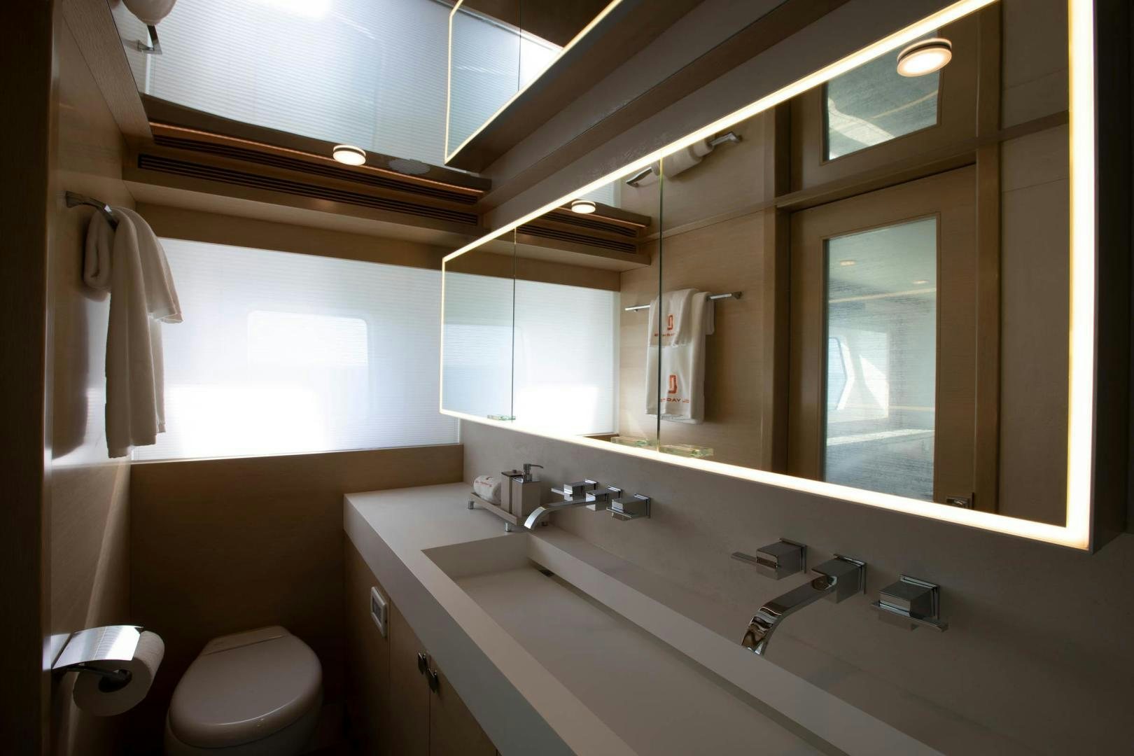 a bathroom with a large mirror aboard ABSOLUTELY Yacht for Sale