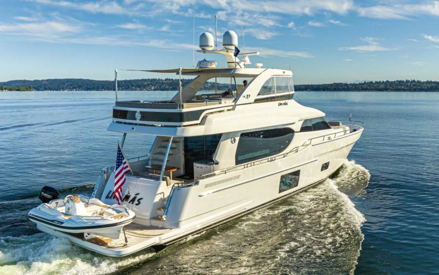 a boat on a rock in the water aboard LIV MAS Yacht for Sale