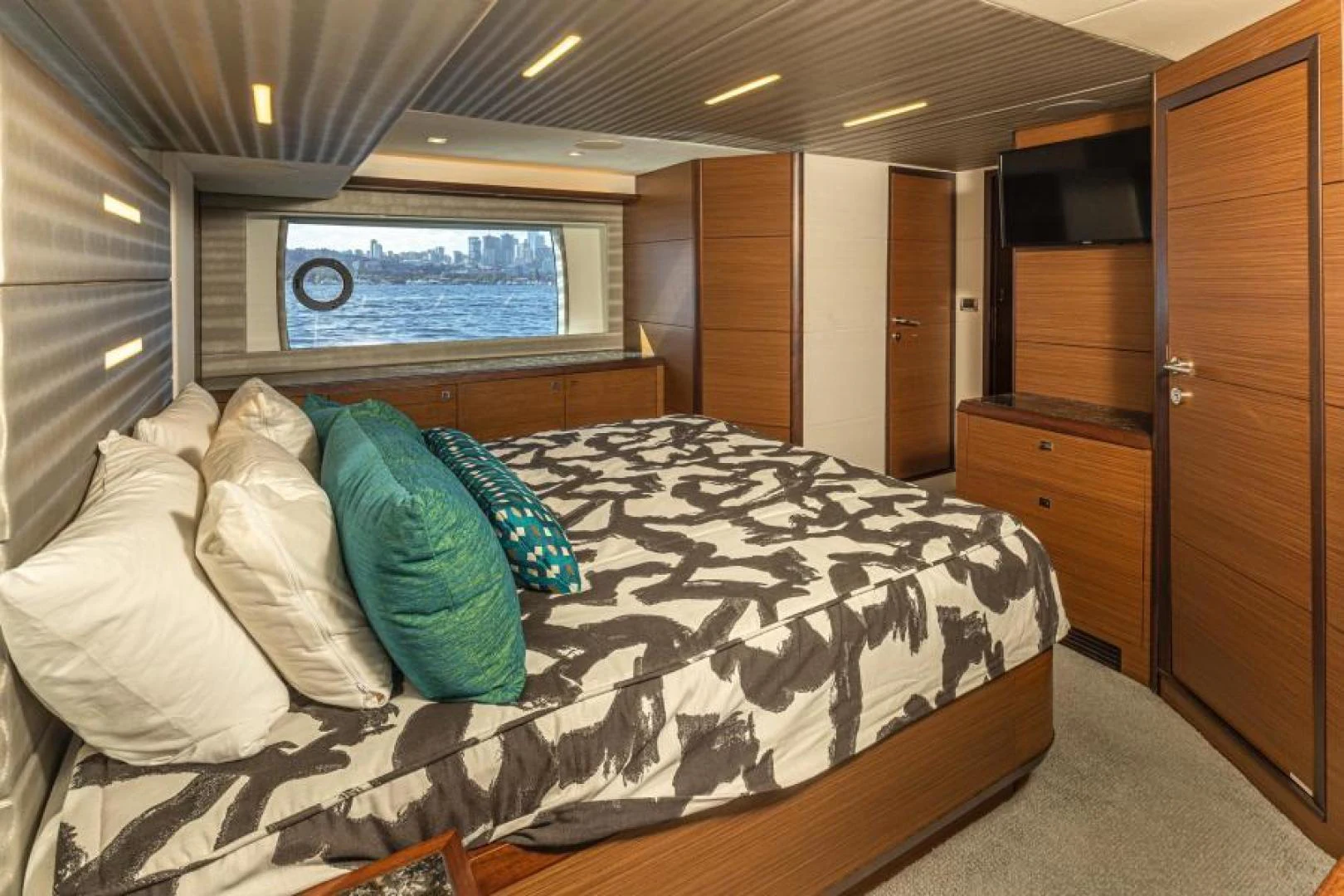 a bed in a room aboard LIV MAS Yacht for Sale