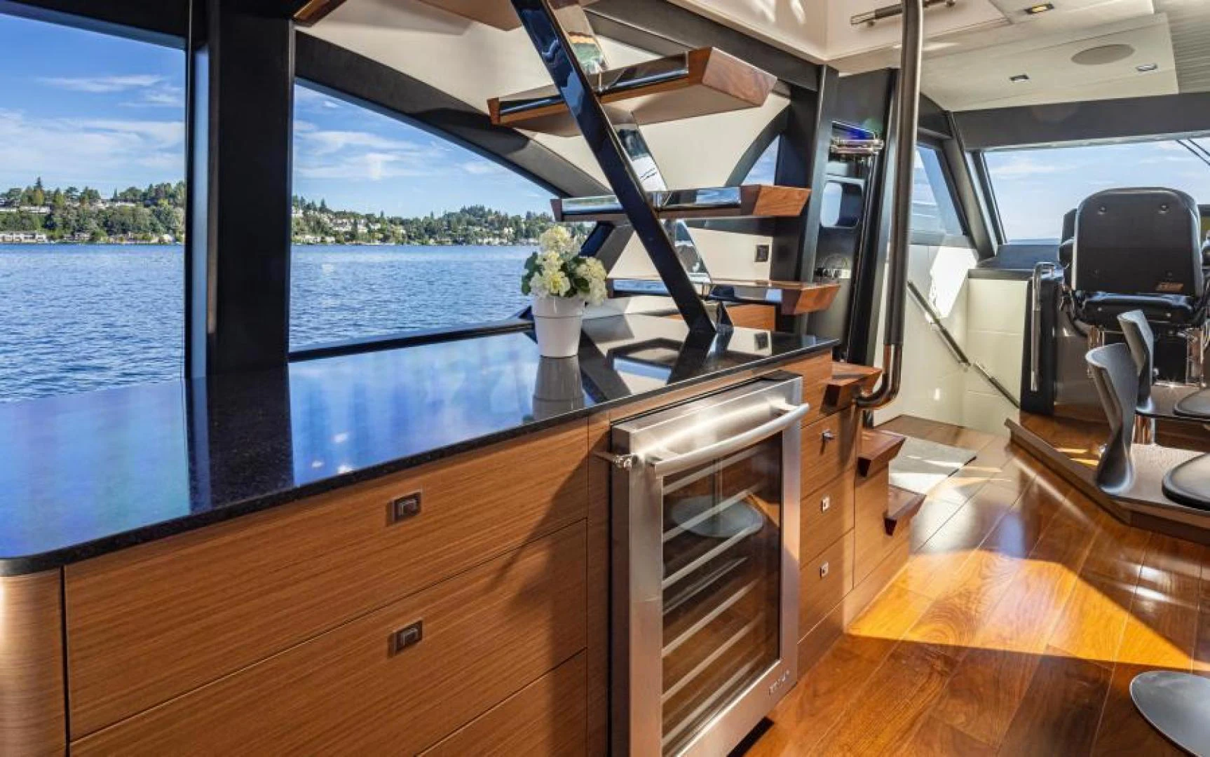 a kitchen with a large glass window aboard LIV MAS Yacht for Sale