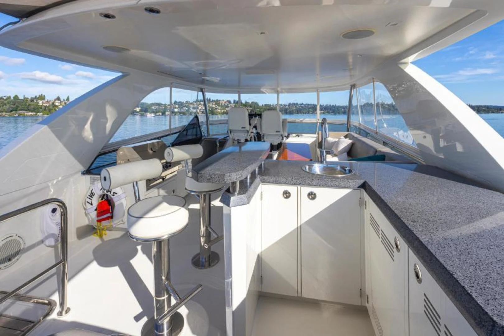 a large kitchen with a view of the ocean aboard LIV MAS Yacht for Sale