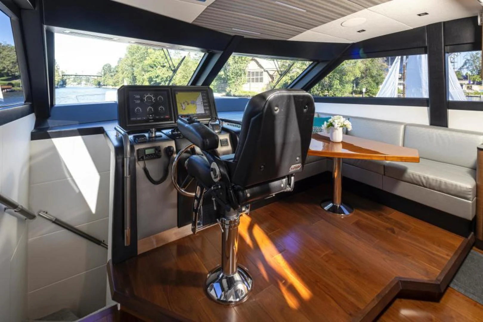 a room with a couch and a table aboard LIV MAS Yacht for Sale