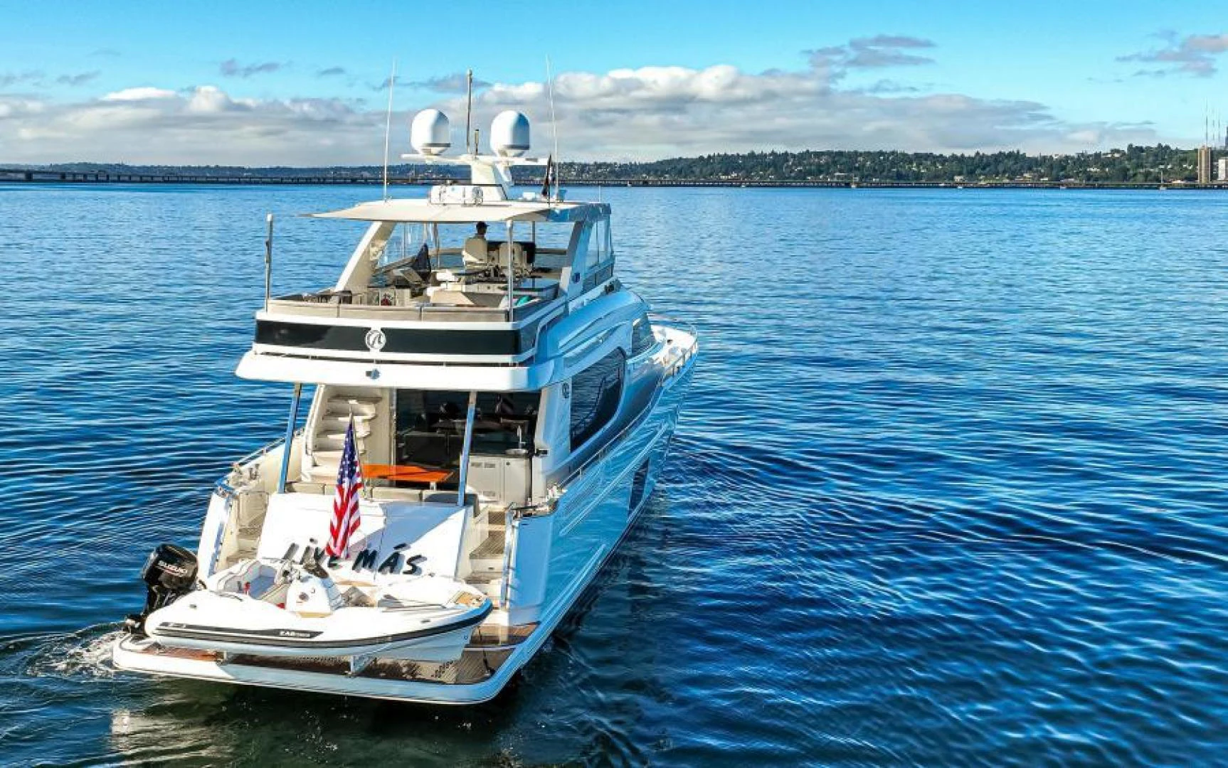a boat sailing on the water aboard LIV MAS Yacht for Sale