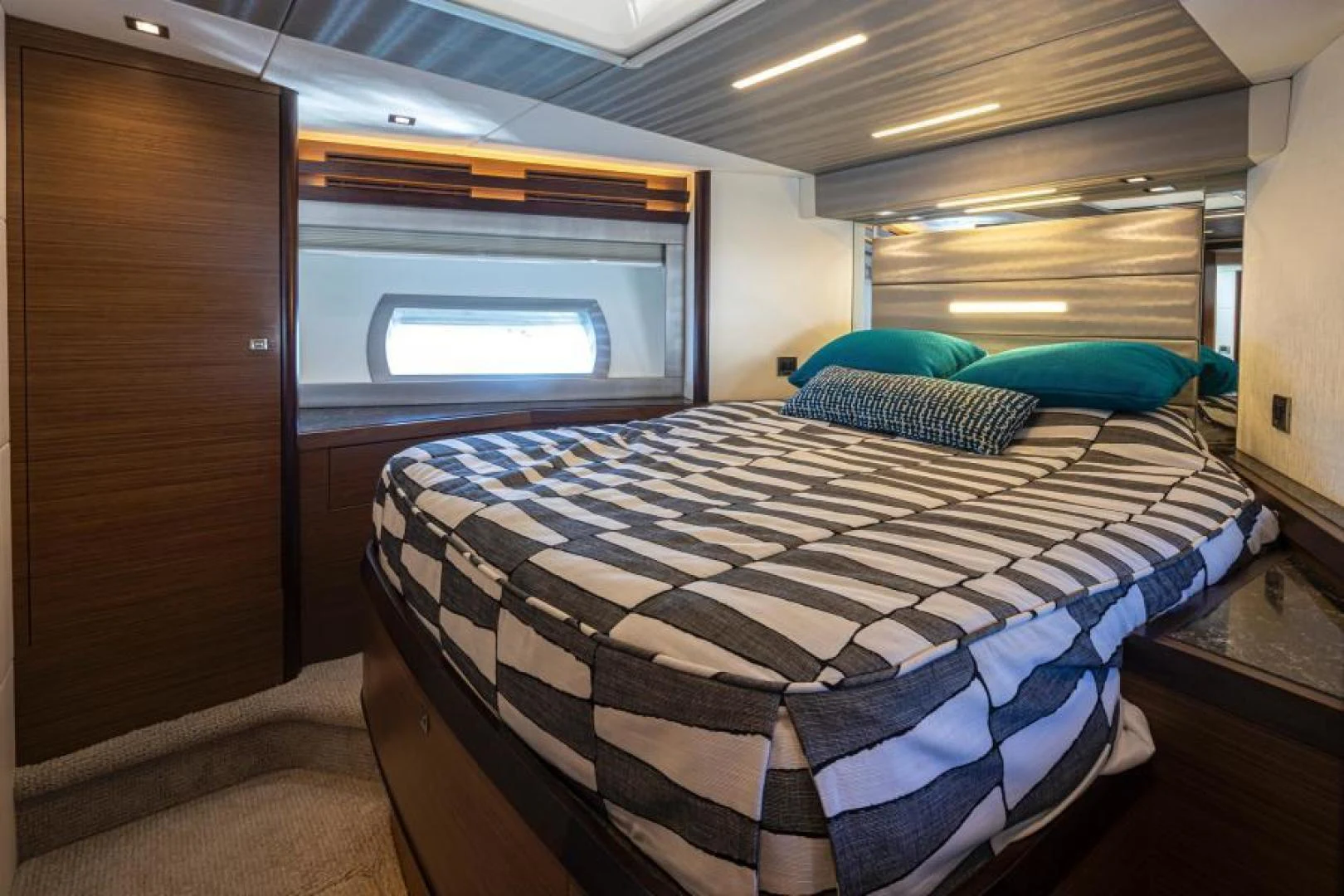 a bed in a room aboard LIV MAS Yacht for Sale