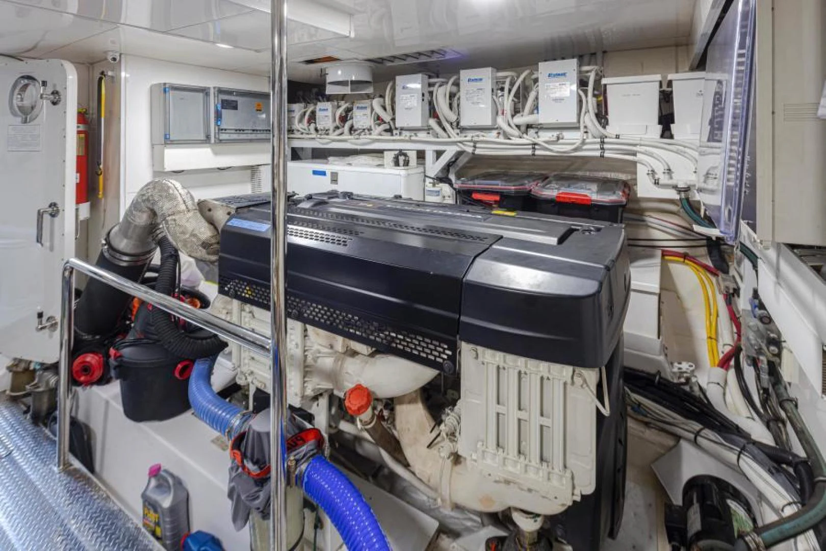 a person working on a machine aboard LIV MAS Yacht for Sale