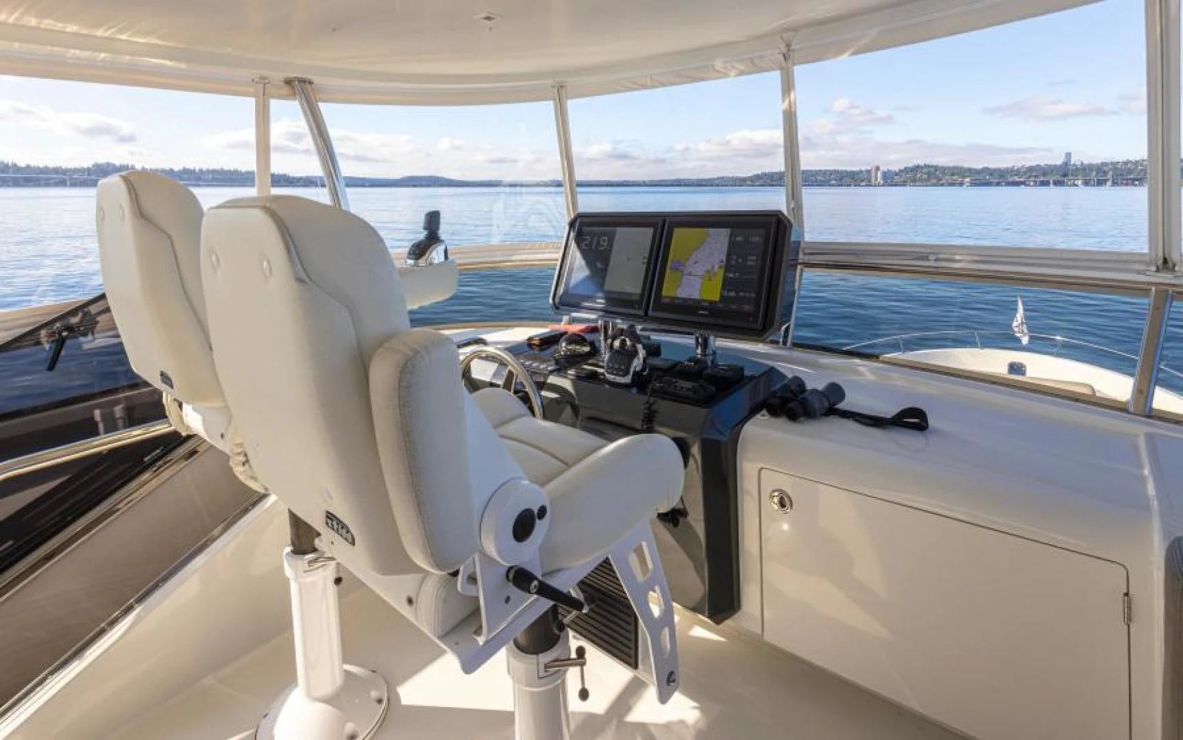 a boat with a tv and a chair on it aboard LIV MAS Yacht for Sale