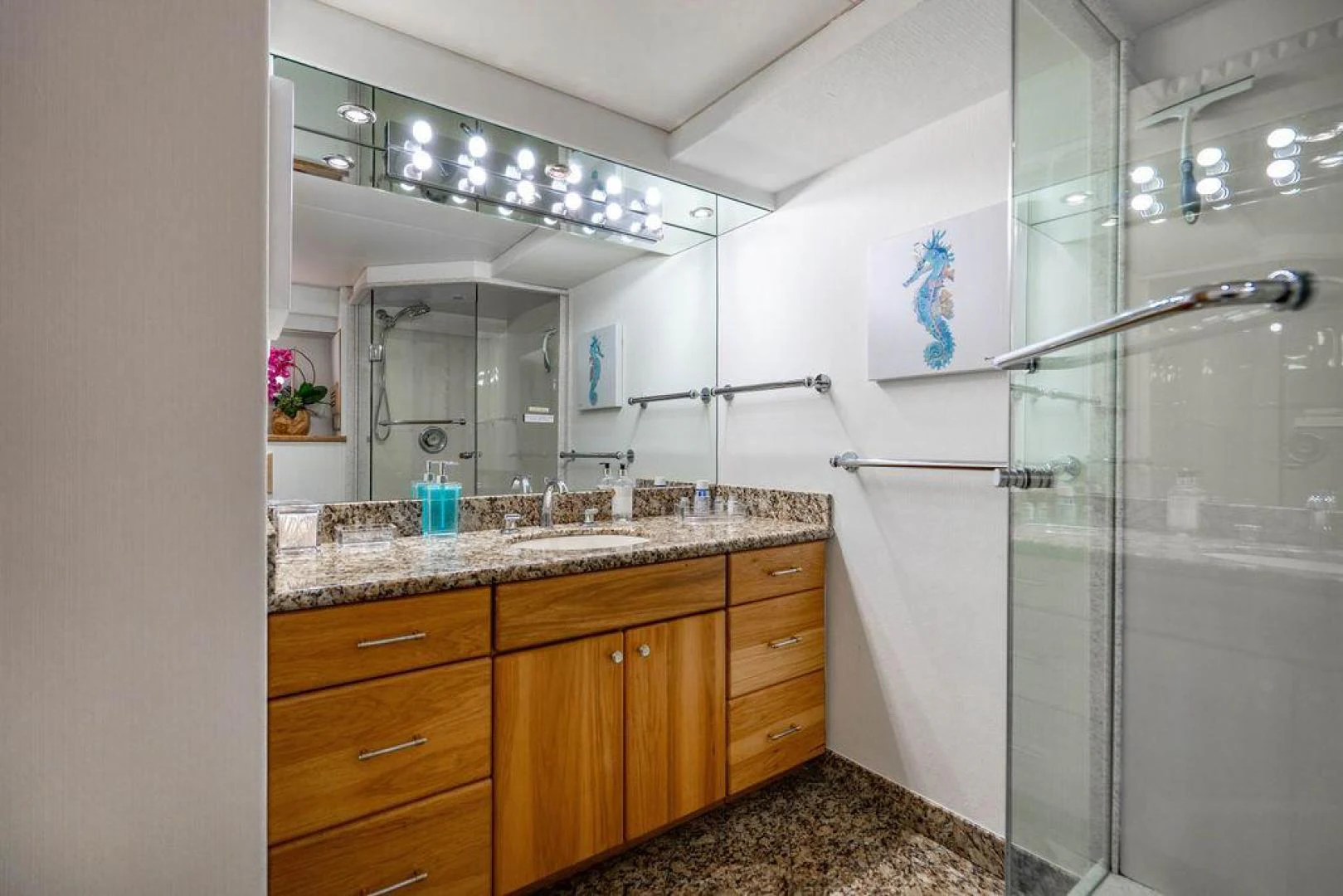 a bathroom with a shower unit and sink aboard THREE BLESSINGS Yacht for Sale