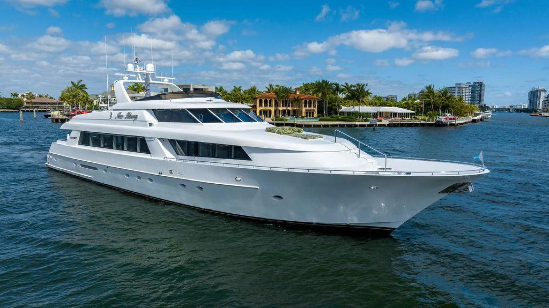 a white yacht in the water aboard THREE BLESSINGS Yacht for Sale