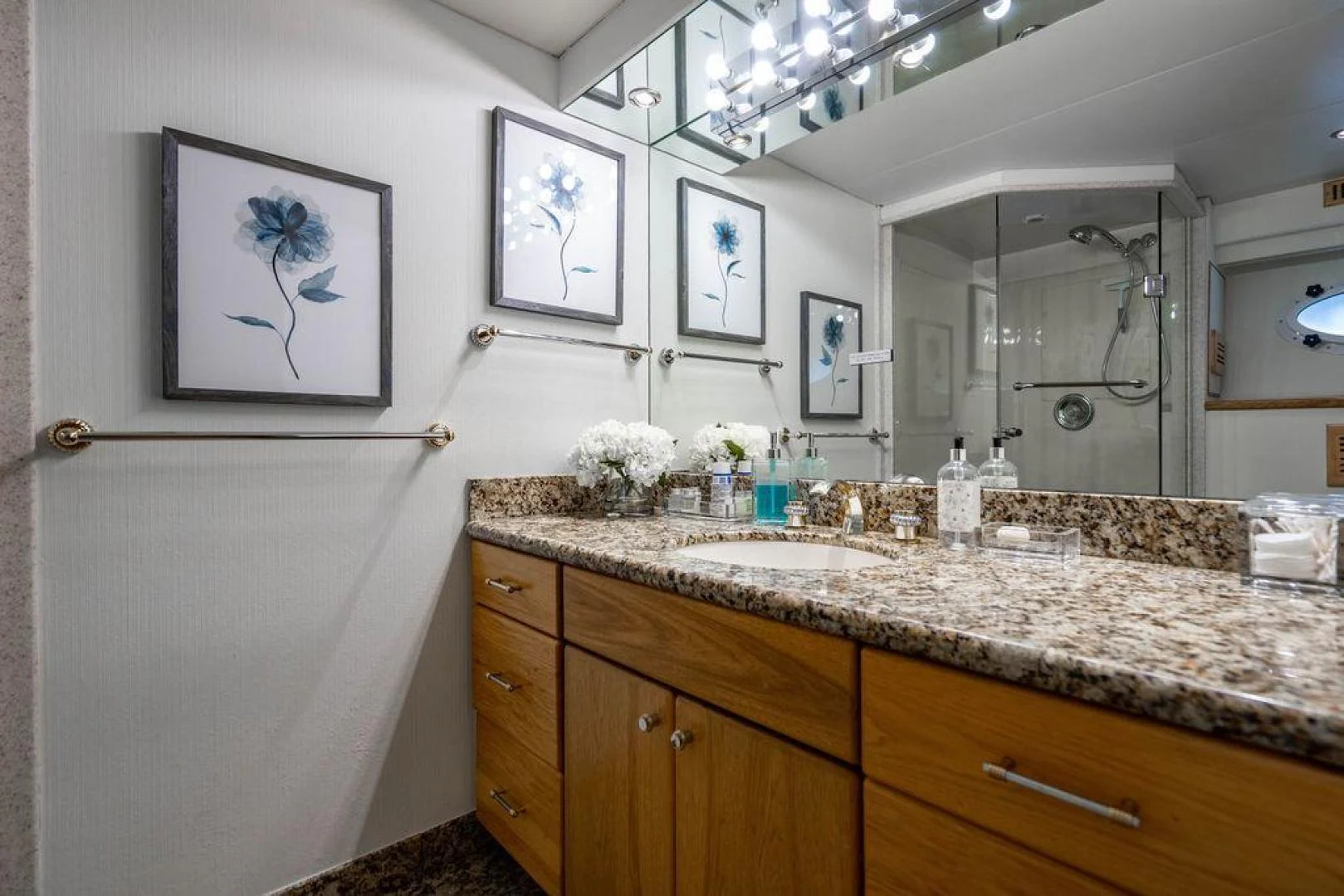 a bathroom with a marble counter top aboard THREE BLESSINGS Yacht for Sale