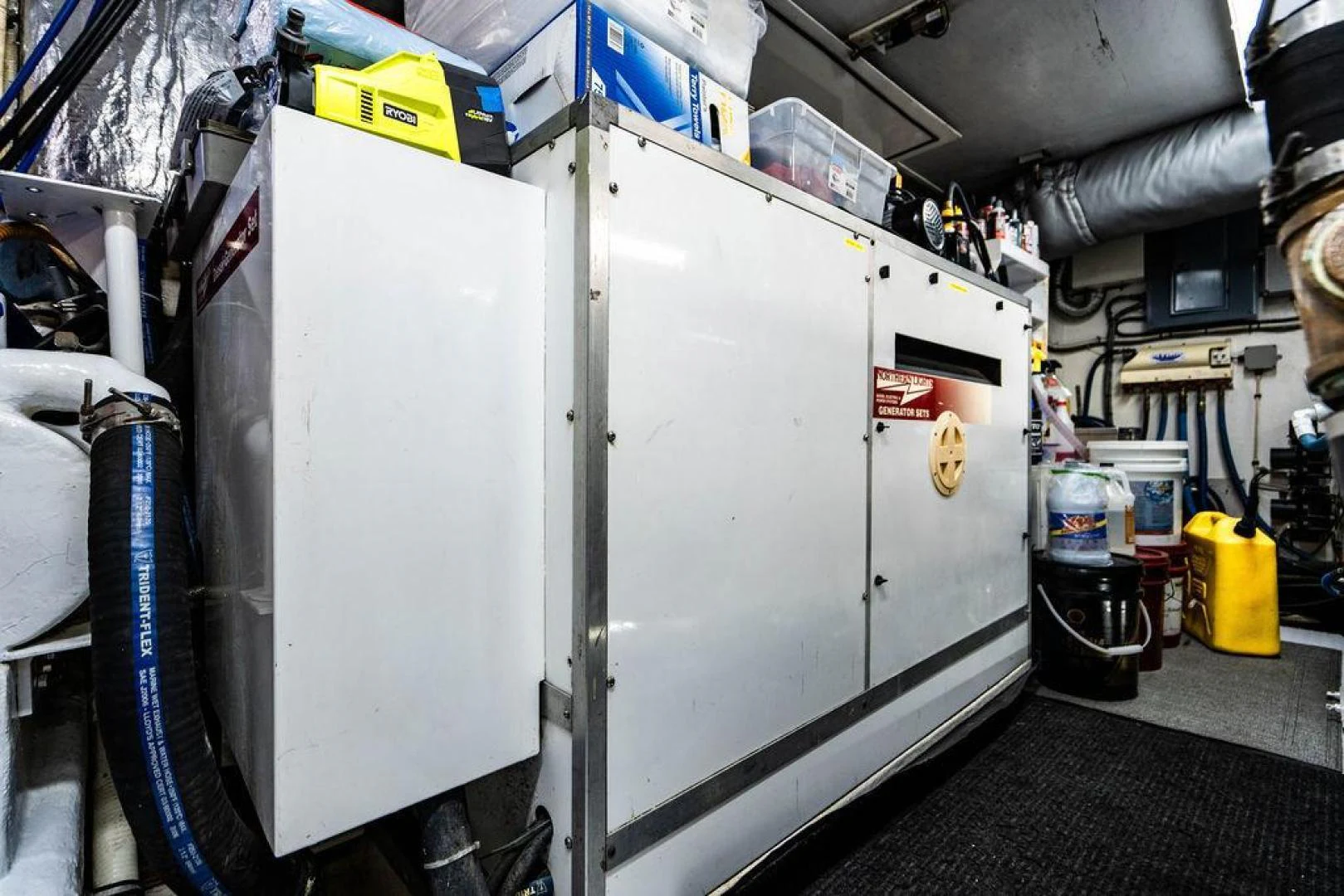 a large white machine in a factory aboard THREE BLESSINGS Yacht for Sale