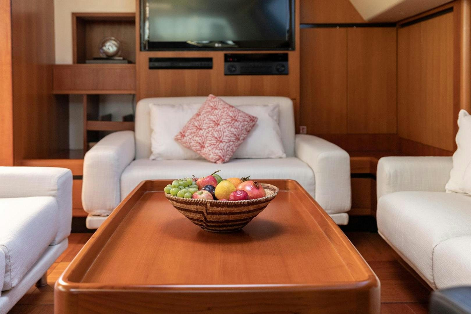 a bowl of fruit on a table aboard KENORA Yacht for Sale