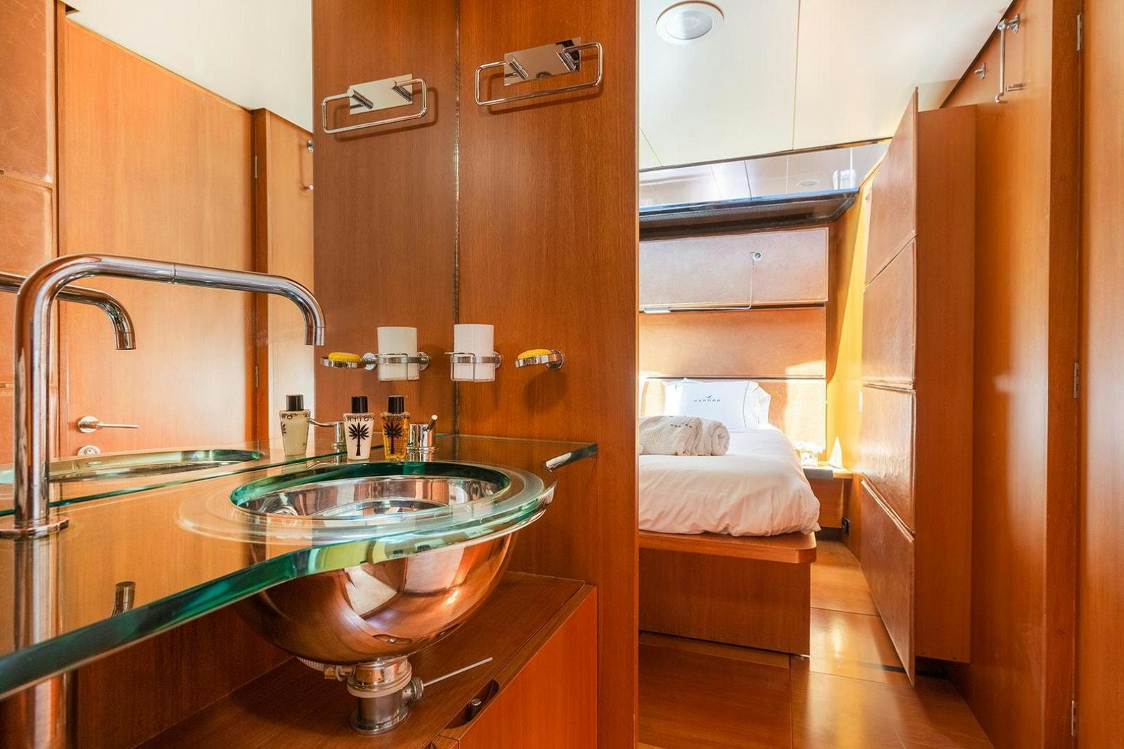 a bathroom with a sink and a mirror aboard KENORA Yacht for Sale