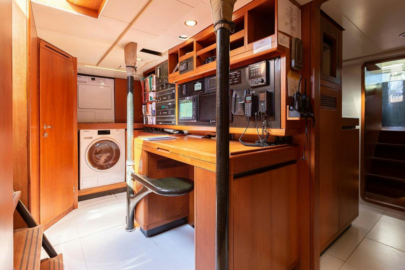 a room with a table and chairs aboard KENORA Yacht for Sale