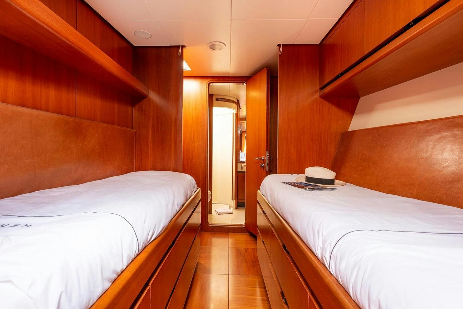 a room with two beds aboard KENORA Yacht for Sale
