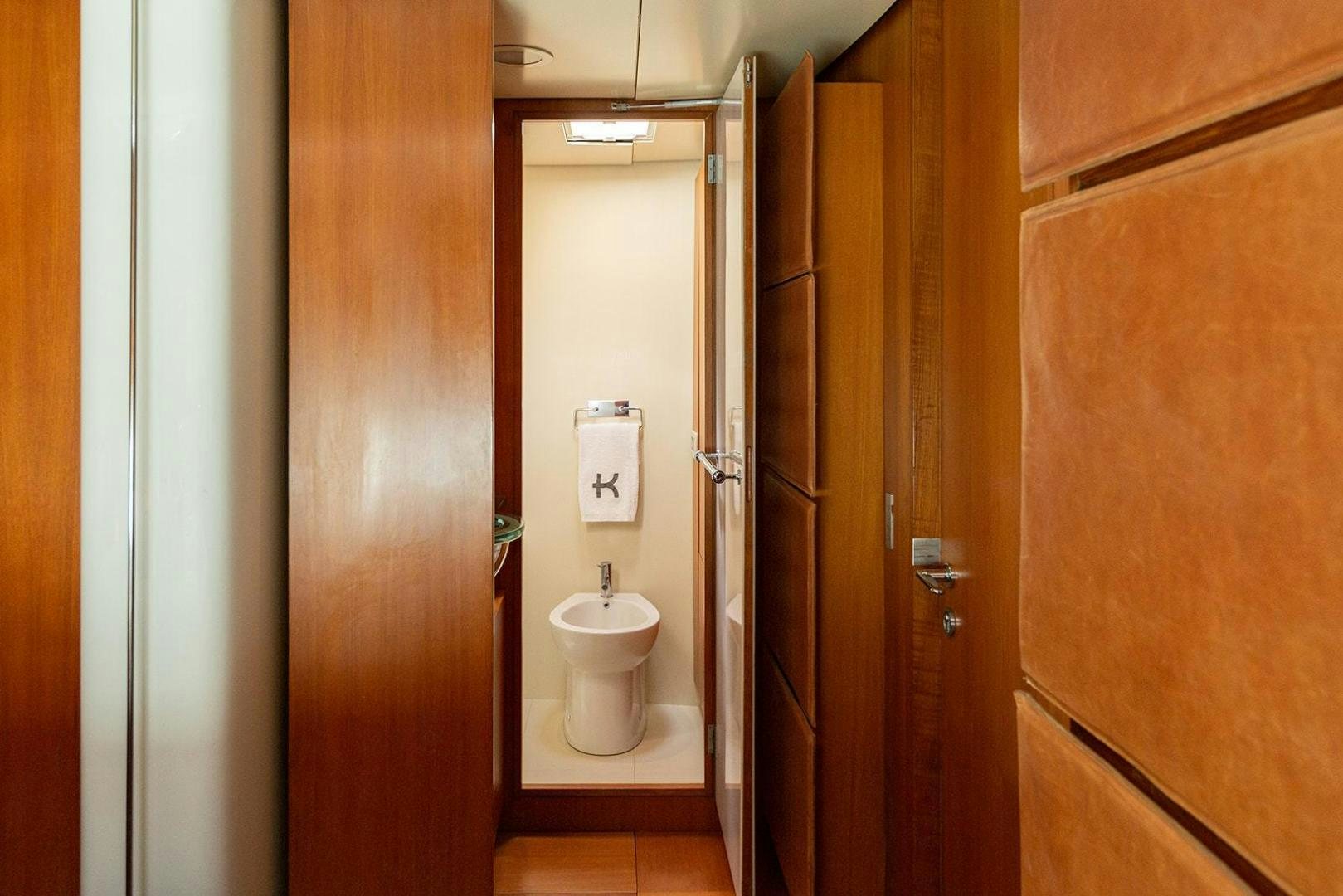 a bathroom with a toilet aboard KENORA Yacht for Sale