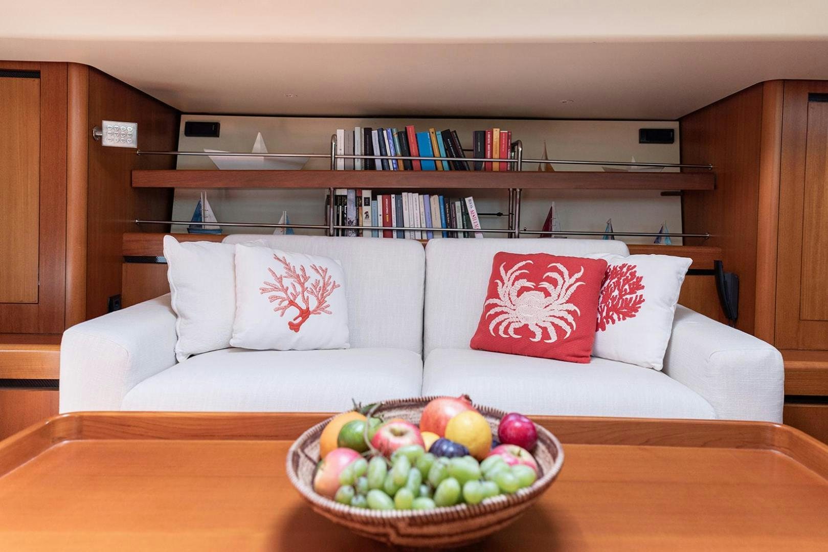 a bowl of fruit on a table aboard KENORA Yacht for Sale