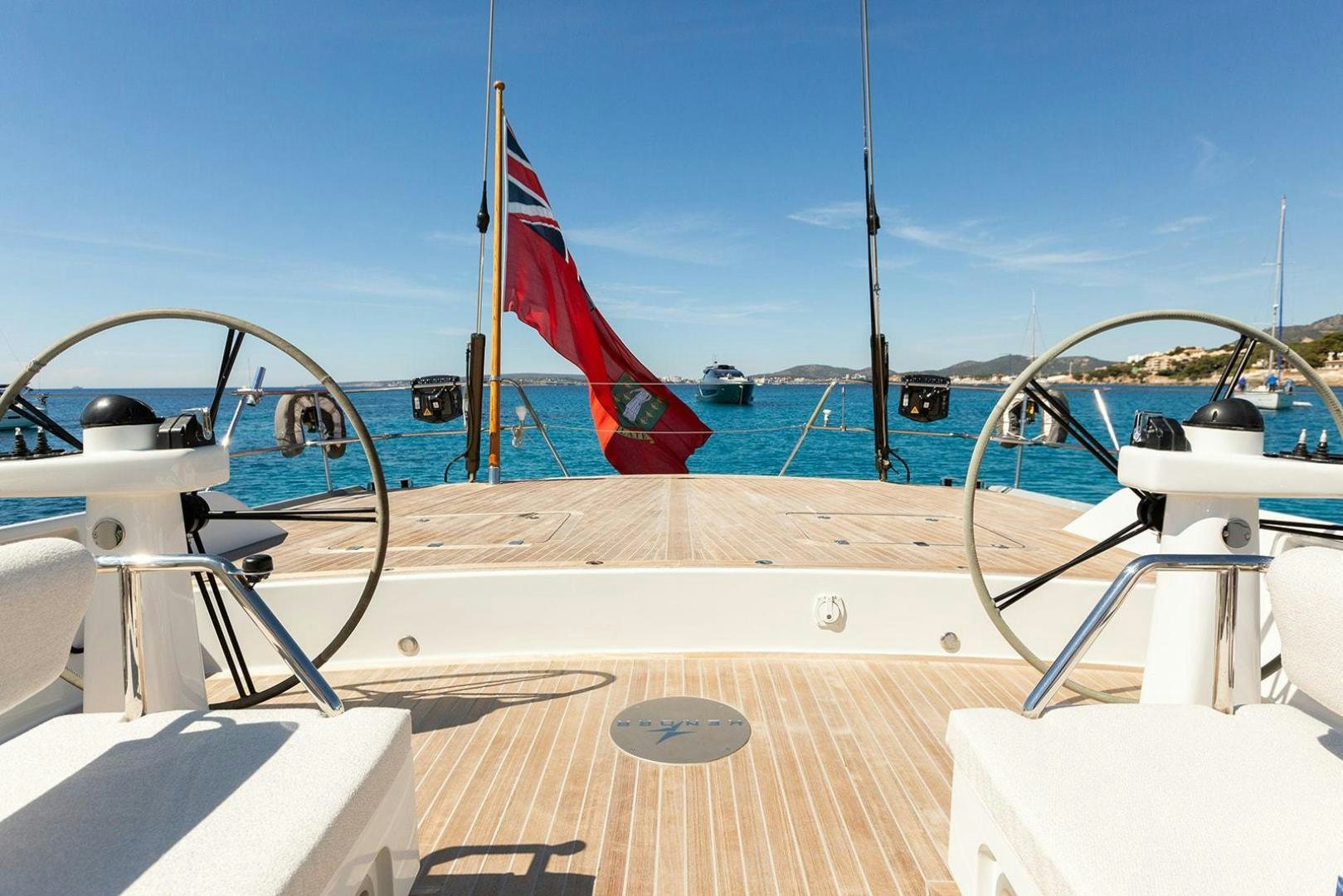 a boat with flags on it aboard KENORA Yacht for Sale