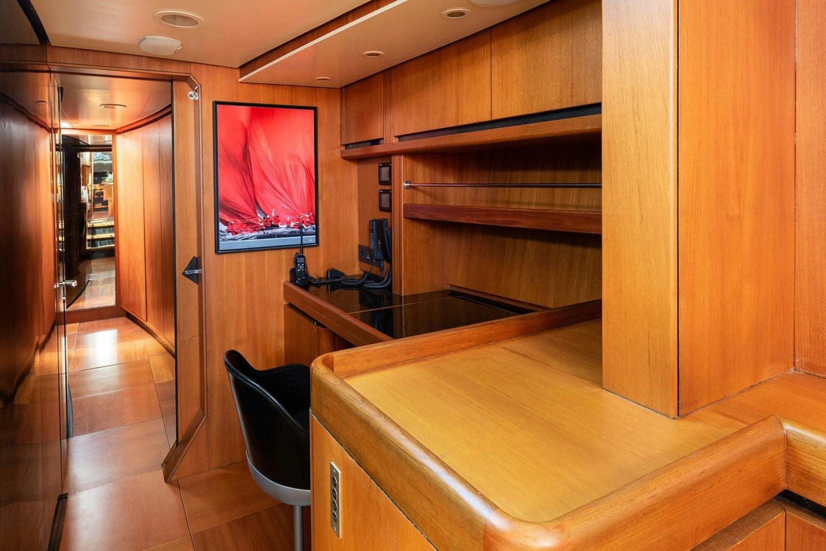 a room with a tv and a table aboard KENORA Yacht for Sale