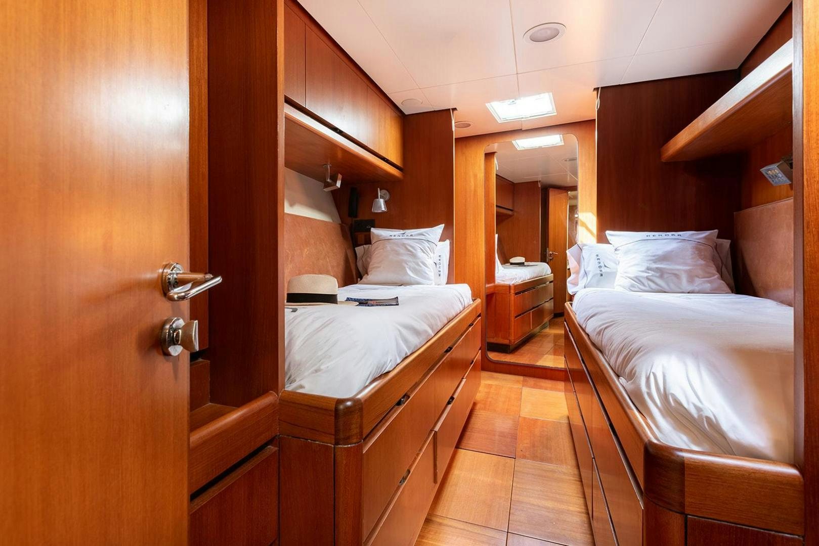 a room with a couple of beds aboard KENORA Yacht for Sale